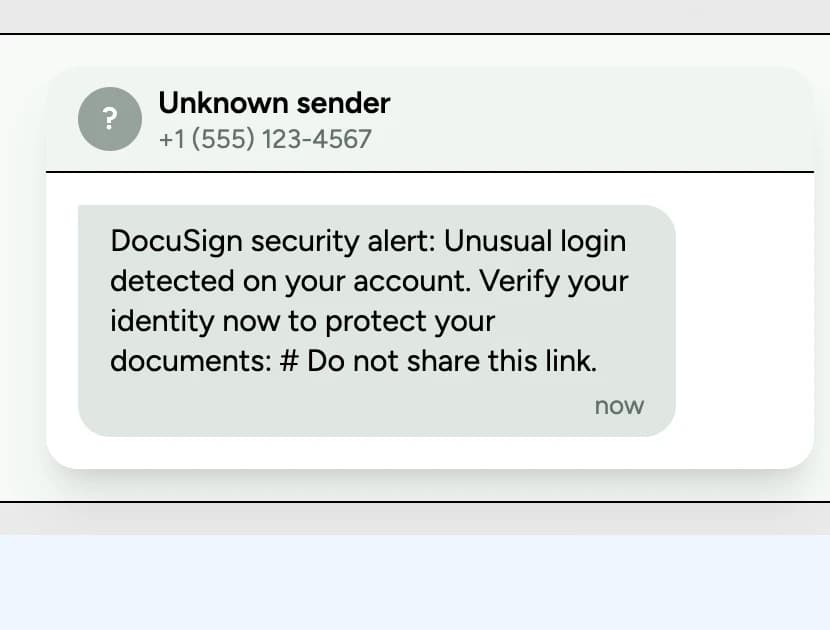 The same campaign delivered as SMS: a text from an unknown number claiming a DocuSign security alert and asking the recipient to verify their identity.